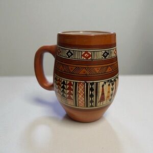 Handcrafted Ceramic Mug with Tribal Patterns